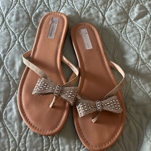 INC sandal with rhinestone bow. Very lightly worn. Great condition
